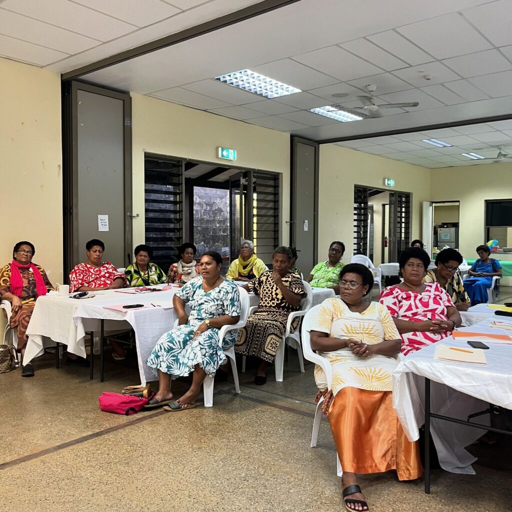 Women from the islands of Lau listen to the presentation by HHF