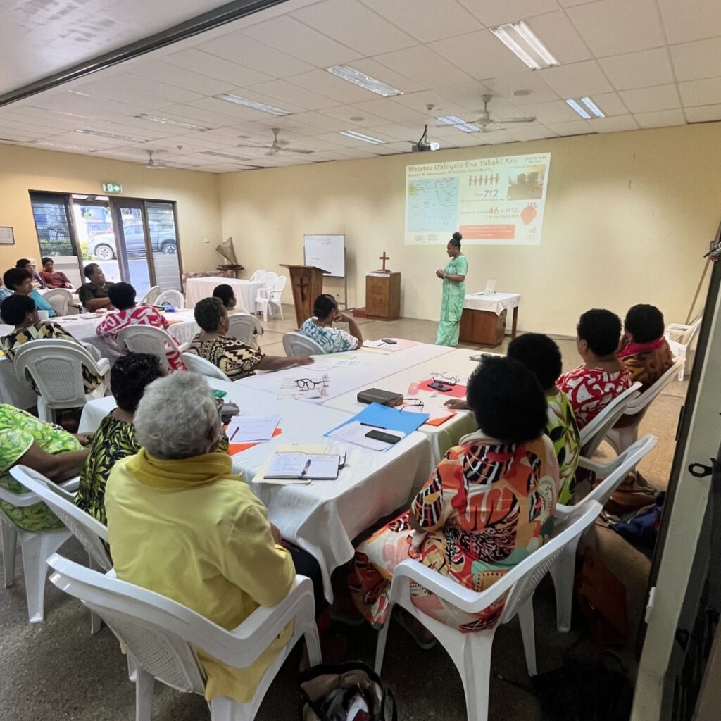 Women from the islands of Lau listen to the presentation by HHF